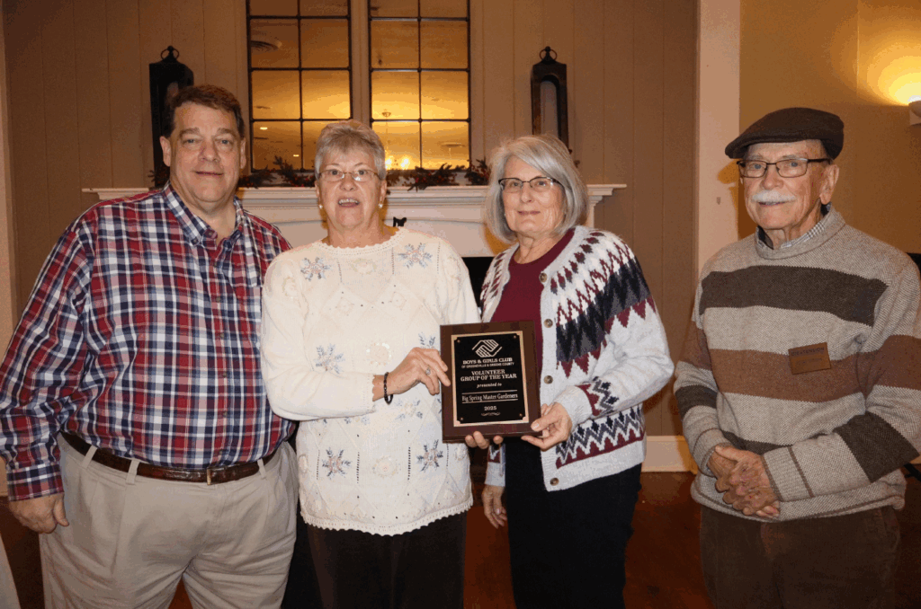 Master Gardeners holding award