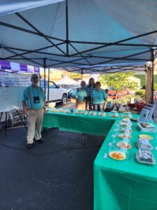 volunteers at the depot street farmers market